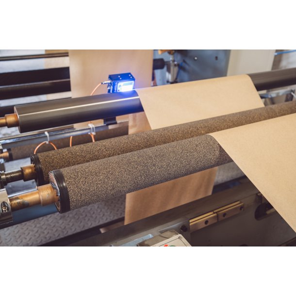 Cork rubber roller coverings handling continuous paper web guiding in converting machinery by Nova Beltech