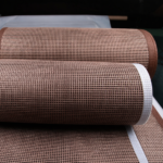 Rolled PTFE open mesh conveyor belts with Kevlar and PTFE edge reinforcements by Nova Beltech