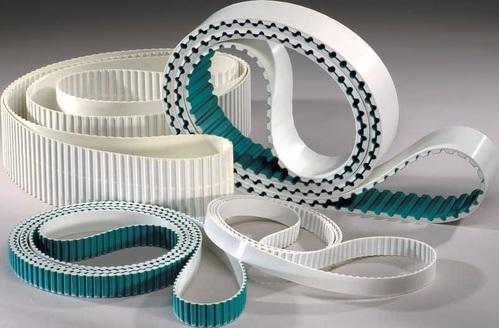 White Polyurethane PU timing belts with green fabric backing for synchronous drive and positioning by Nova Beltech