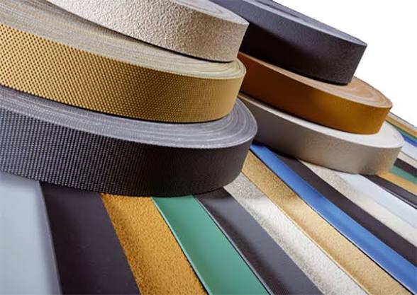 Rolled industrial roller covering tapes and synthetic lagging strips in various surface textures by Nova Beltech