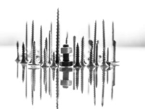 Creative skyline arrangement of industrial screws hex bolts and nuts hardware for MRO supplies by Nova Beltech