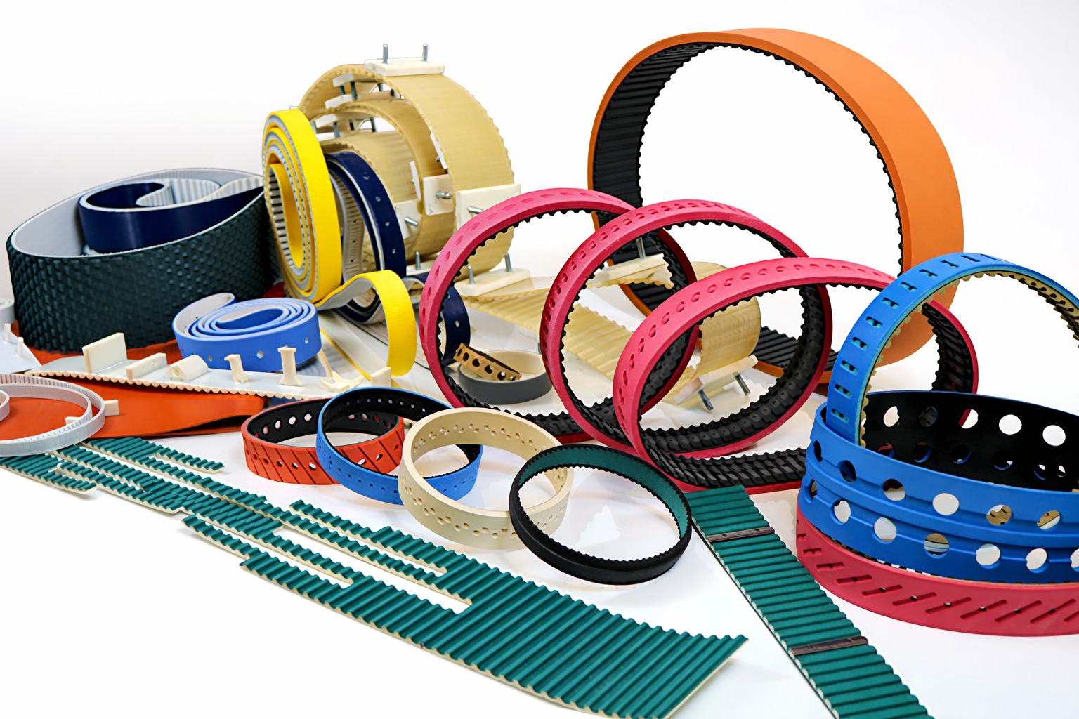 Custom industrial timing belts with cleats, special backings, and vacuum holes by Nova Beltech