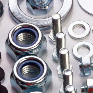 Industrial MRO hardware fasteners including hex bolts, nylon lock nuts, and washers by Nova Beltech